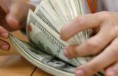 DÓLAR REAGE A MEDIDAS DO GOVERNO E FECHA EM ALTA APÓS SEIS QUEDAS
